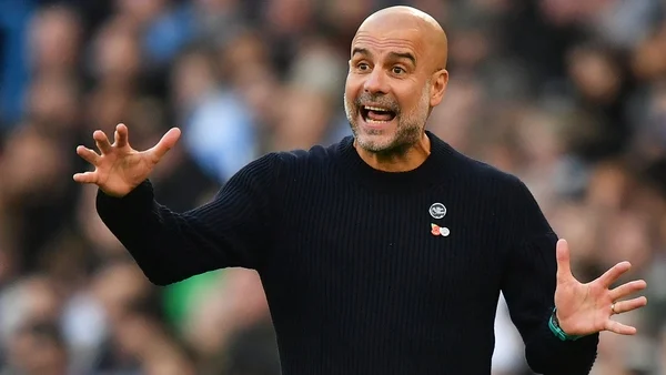 Pep Guardiola: City have battle on hands in title defence