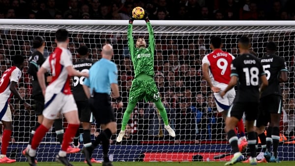 Salah nicks point as Liverpool stay ahead of Gunners