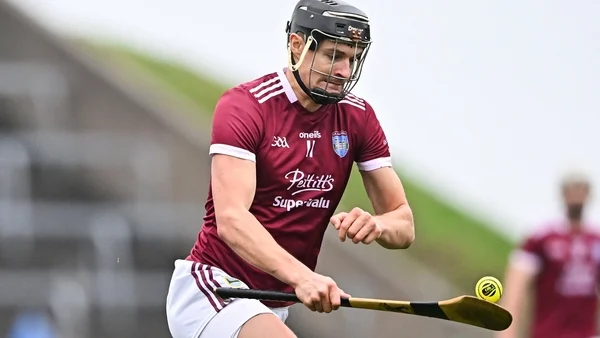 St Martin's eventually find enough to grind down Naas