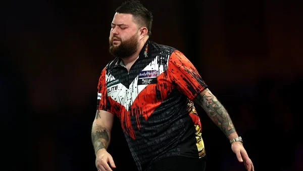 Former world darts champion Michael Smith crashes out at first hurdle